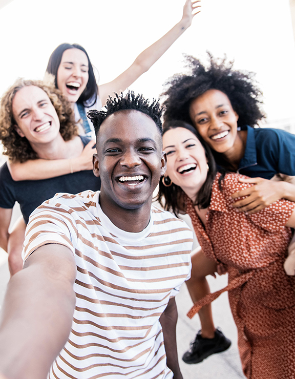 Student smiling in a group