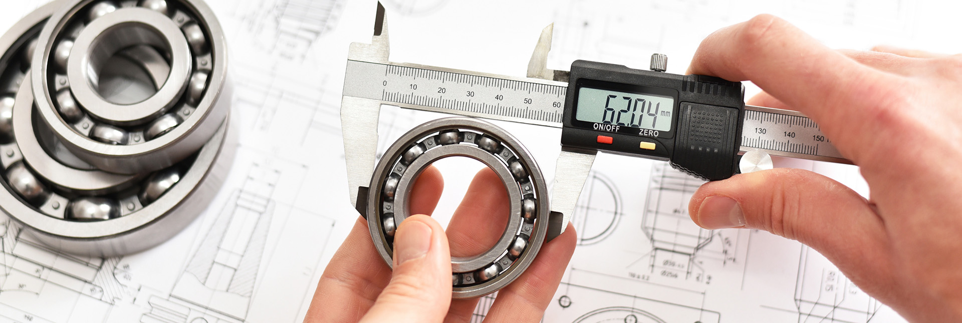 Person measuring a mechanical device