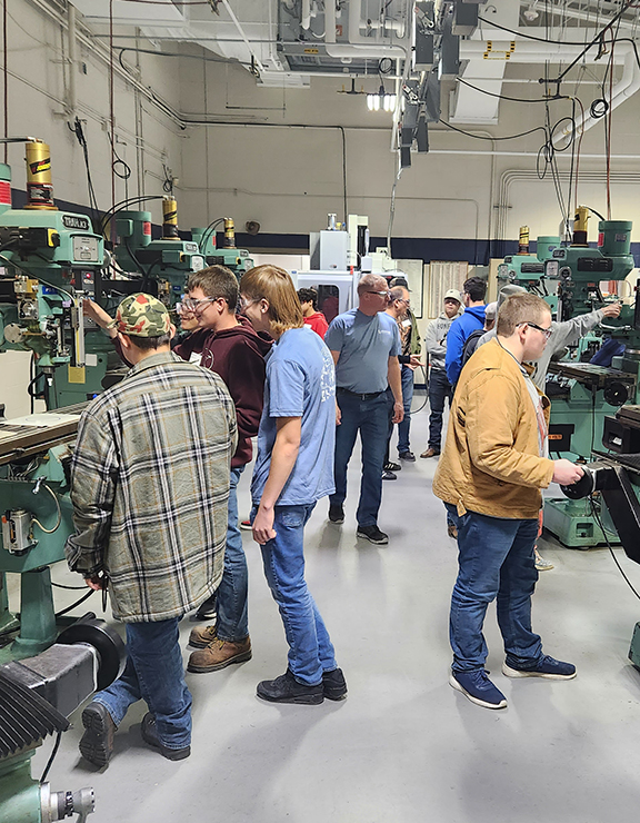 High School Students using machines