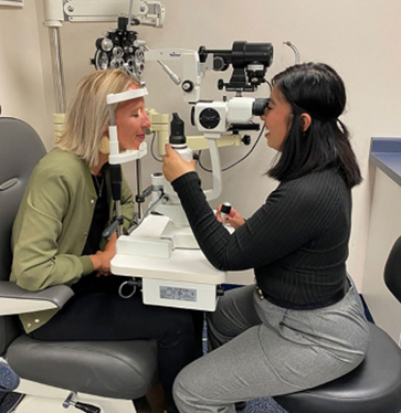 While a student, Jessika Mata, right, practiced skills she needed to master through instruction from Dr. Cori Wicklund, left, Lakeshore Technical College’s Ophthalmic Medical Assistant Instructor.