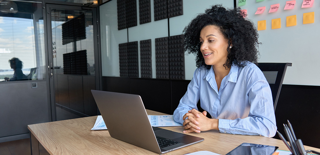 Lady sitting at her desk